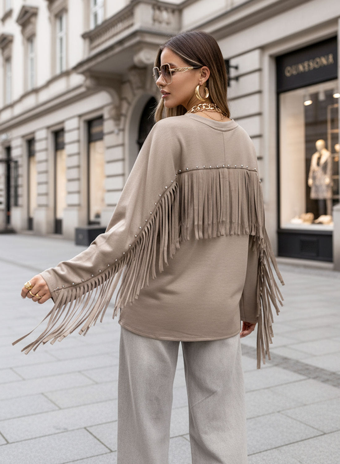 Beige maxi sweater with studs and fringes