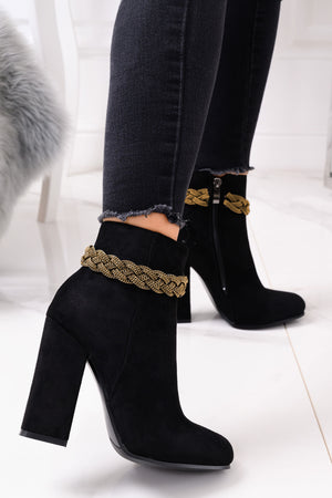 Black Alexoo ankle boots with gold jewel at the ankle