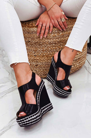 Black wedge sandals with silver rope inserts
