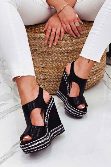 Black wedge sandals with silver rope inserts