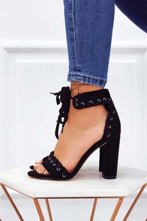 Black suede sandals with comfortable heel and strap