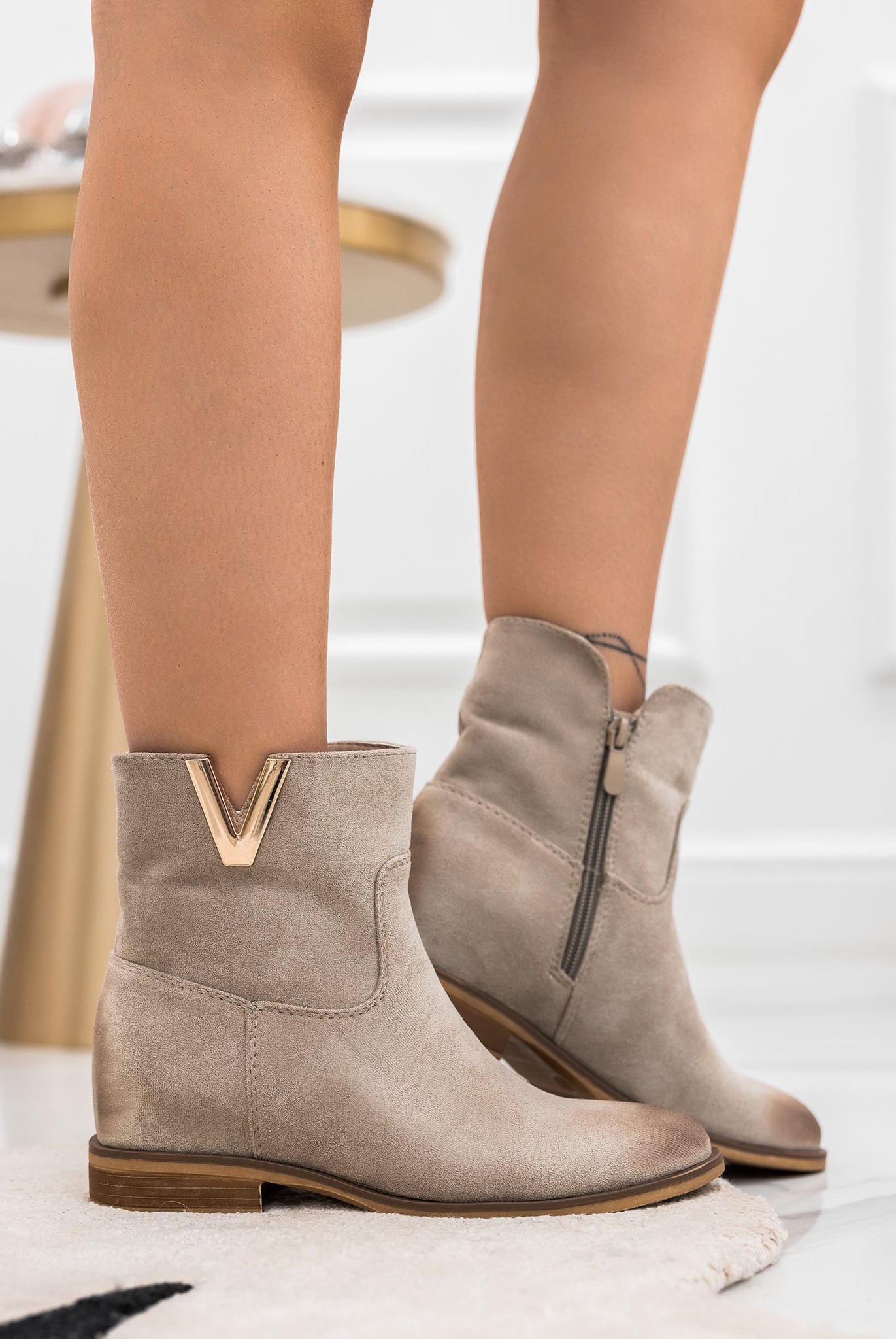 Beige suede ankle boots with internal wedge