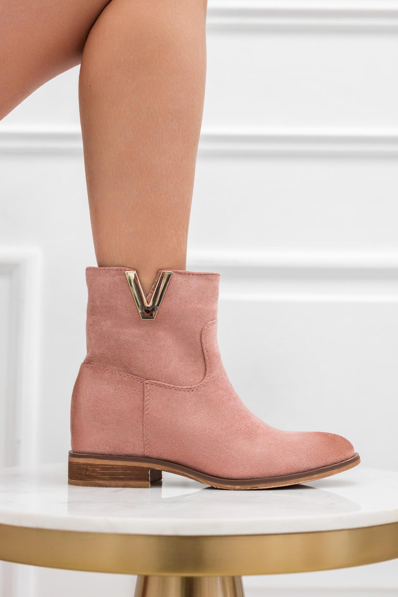 Pink suede ankle boots with internal wedge