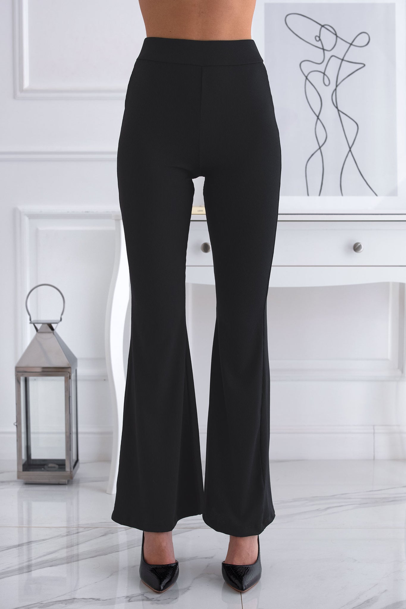 Black flared ribbed stretch trousers