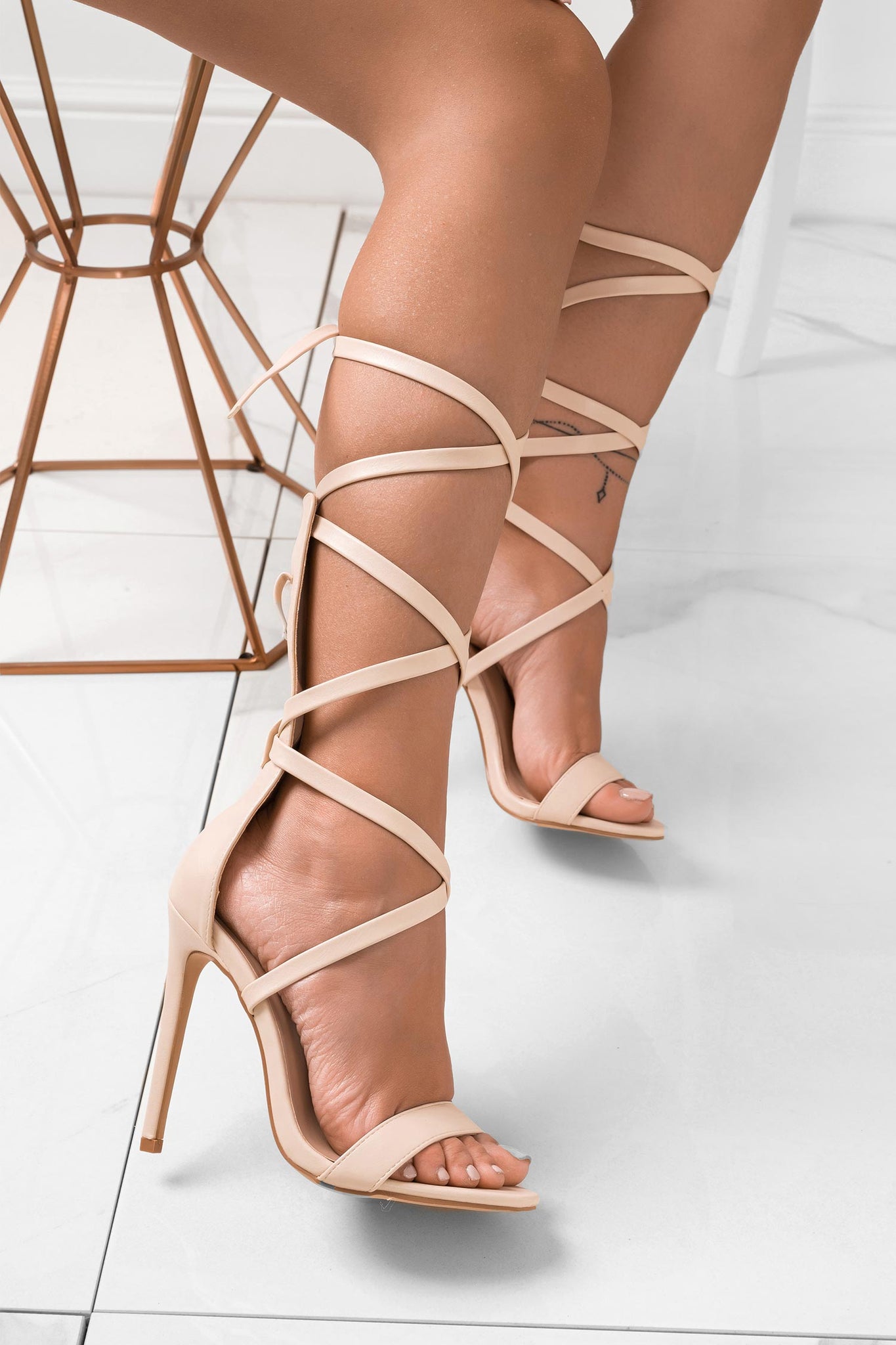 Beige lace-up sandals with high heel