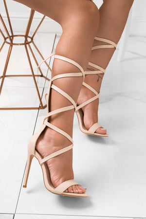 Beige lace-up sandals with high heel