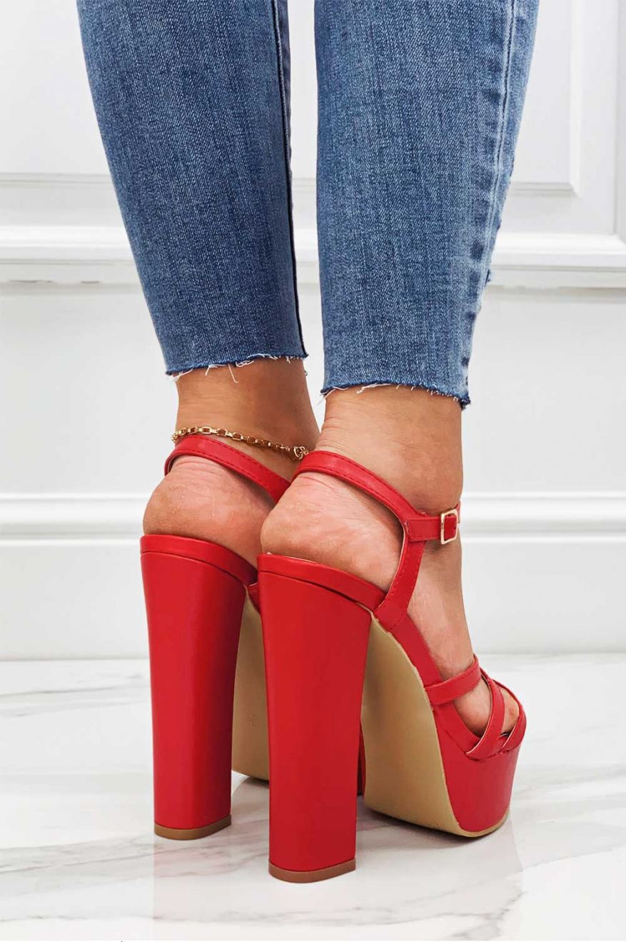 Red faux leather sandals with high heels
