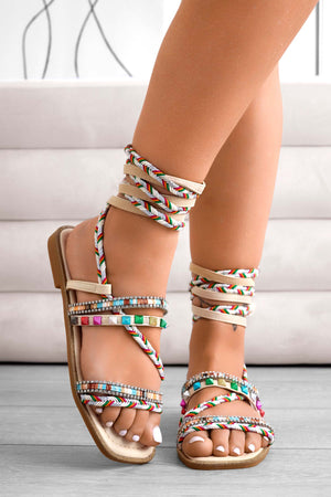 Beige flat sandals with multicolor studded laces