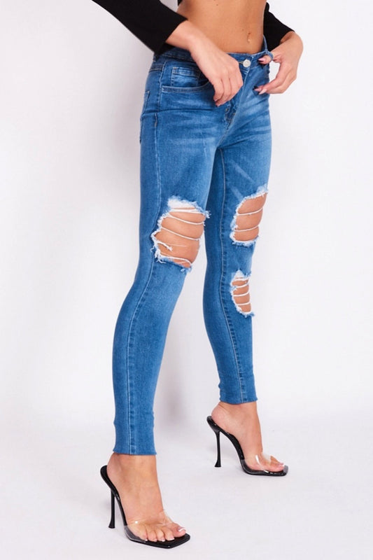 Pantalone jeans skinny blu con strappi