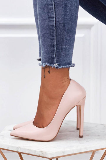 Pink faux leather pumps with high heel