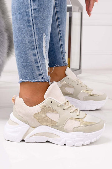 Beige sneakers with thick sole and gold inserts