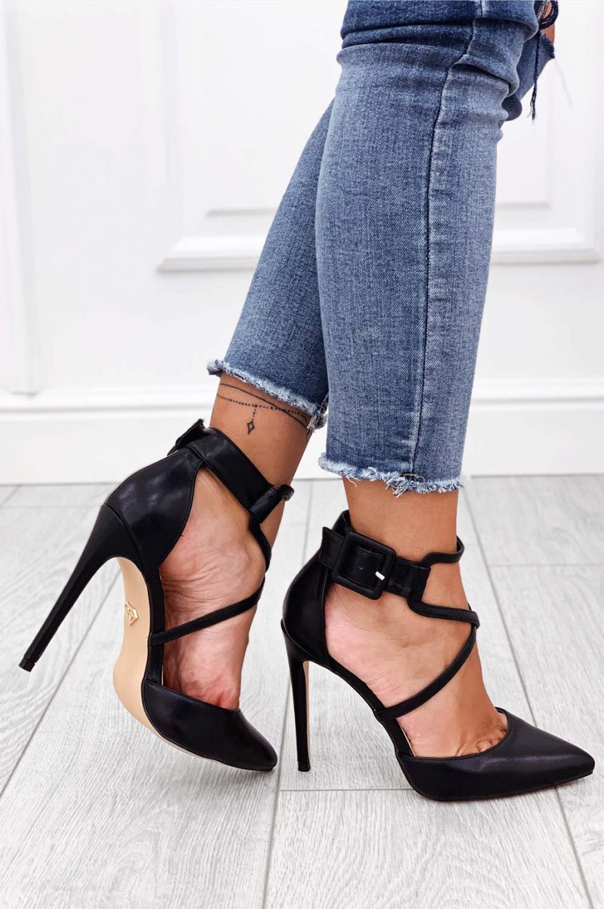Black faux leather pumps with high heel