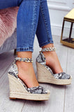 Espadrillas pitonate metallizzate con zeppa alta e borchie oro Alexoo