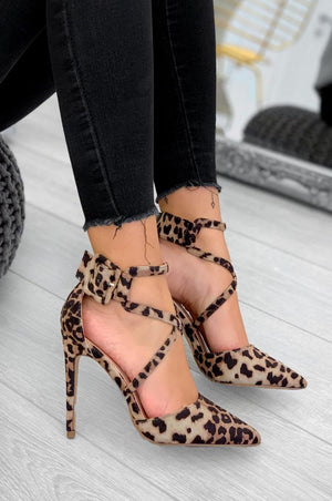 Decolleté with stiletto heel and spotted buckle