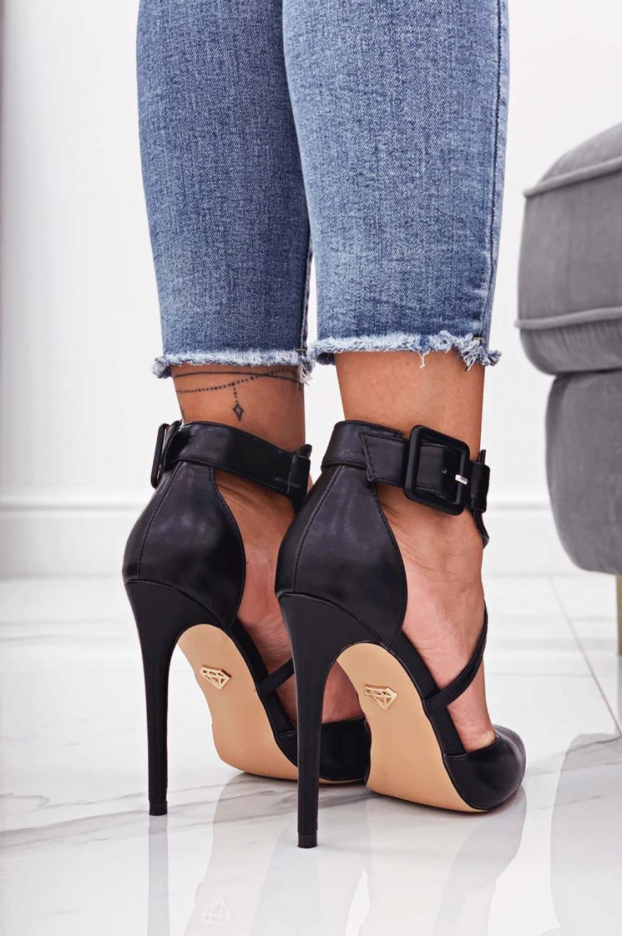 Black faux leather pumps with high heel