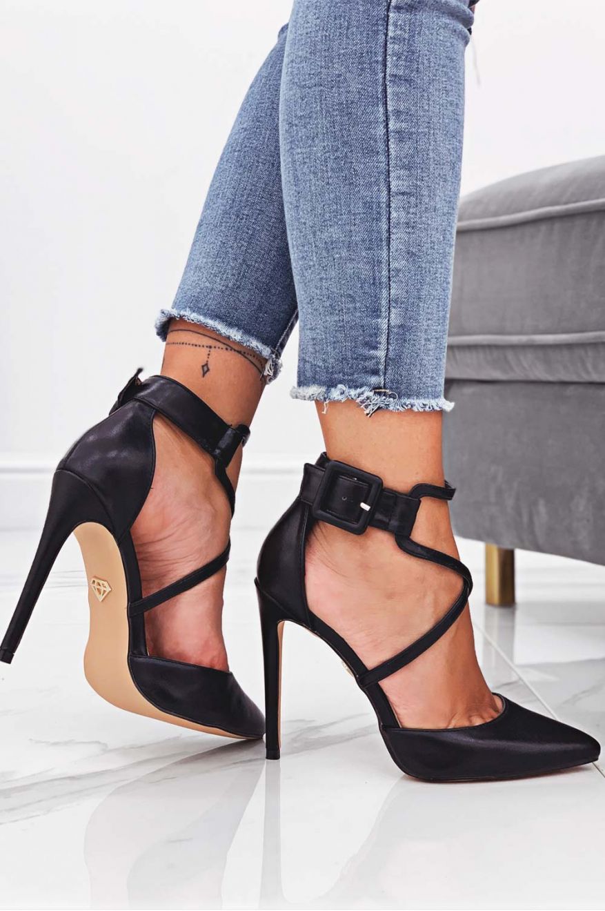 Black faux leather pumps with high heel