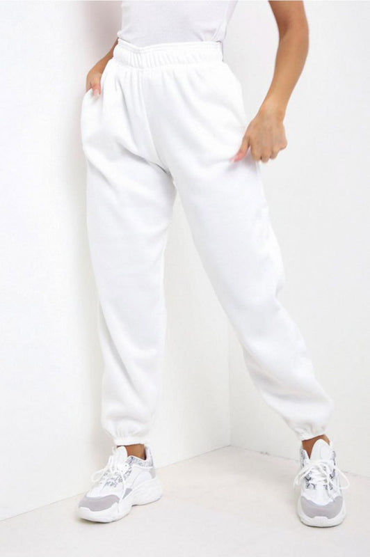 Pantalone tuta bianco con tasche e molla