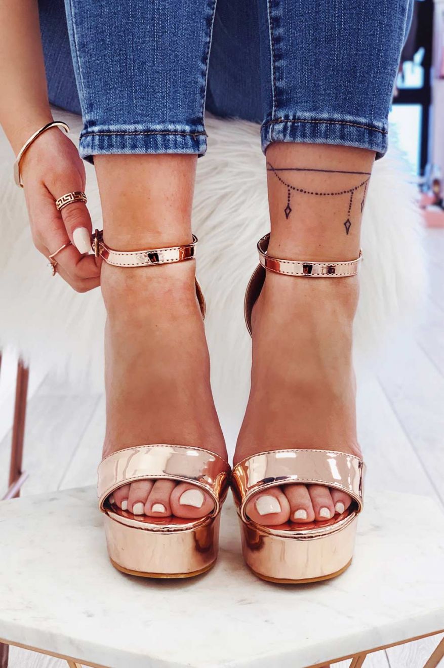 Rose gold patent sandals with high heel and ankle strap