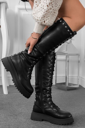 Black combat boots with studs and back zipper