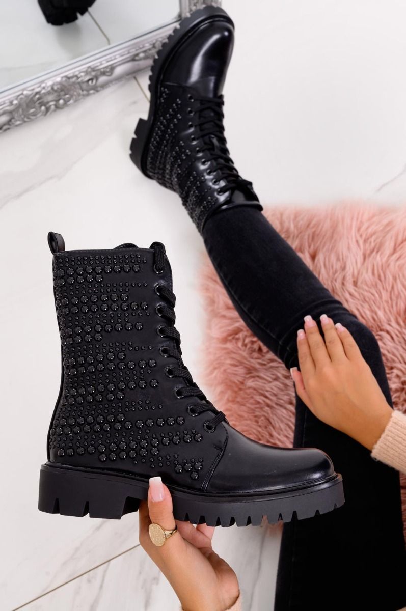 Black combat ankle boots with studs