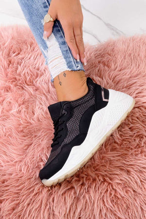 Black sneakers with python effect and thick sole