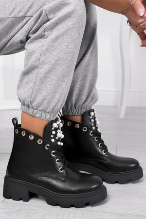 Black ankle boots with pearls and rhinestones