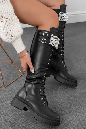 Black combat boots with pearls and rhinestones