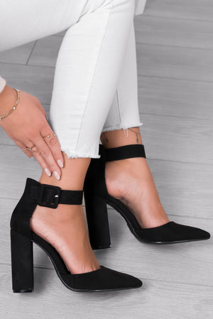 Black suede pumps with strap and comfortable heel