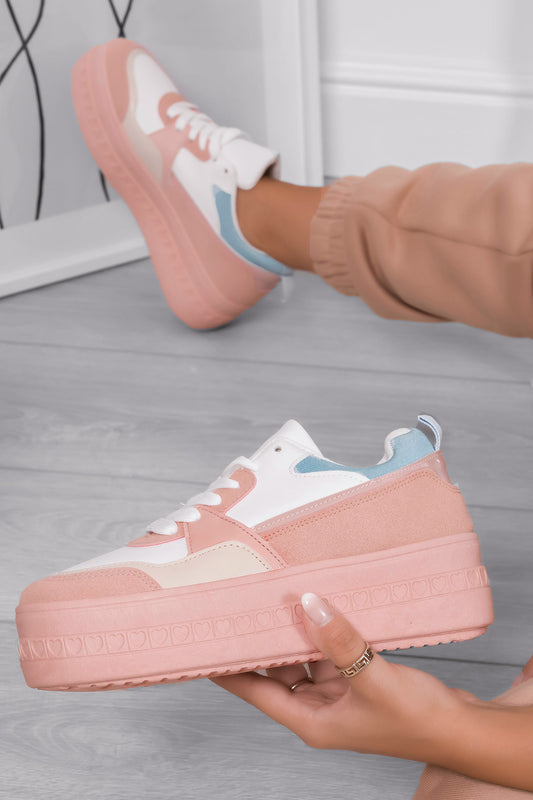 Sneakers rosa con suola alta