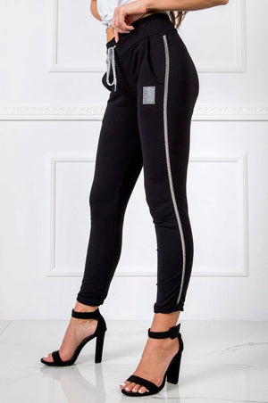 Black sweatpants with drawstring and contrasting stripe