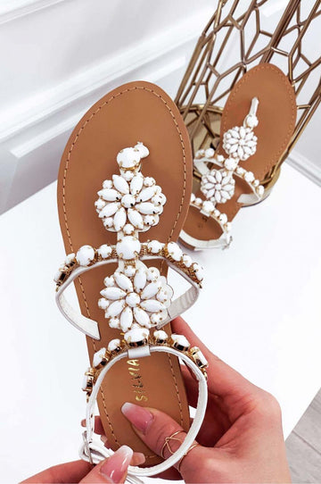 Flat white jeweled thong sandals with stones