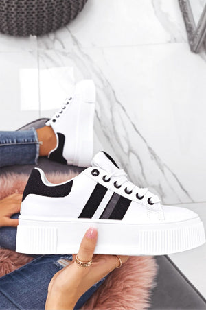 White sneakers with laces and black glitter inserts