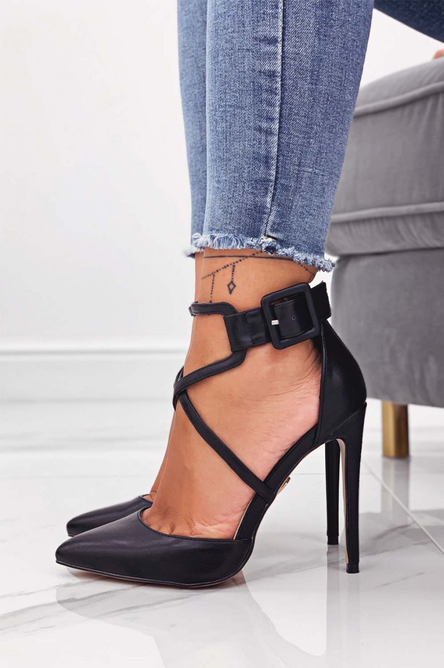 Black faux leather pumps with high heel
