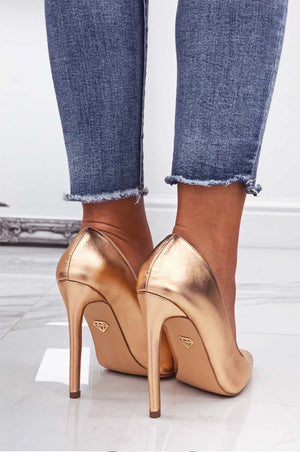 Metallic rose gold pumps with high heel