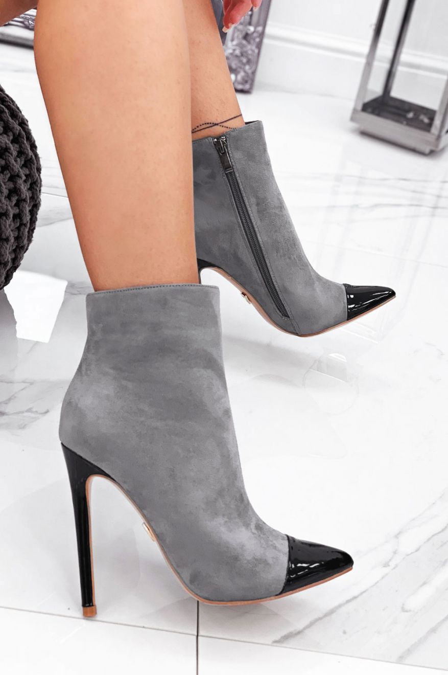 Gray ankle boots with heel and black patent leather toe