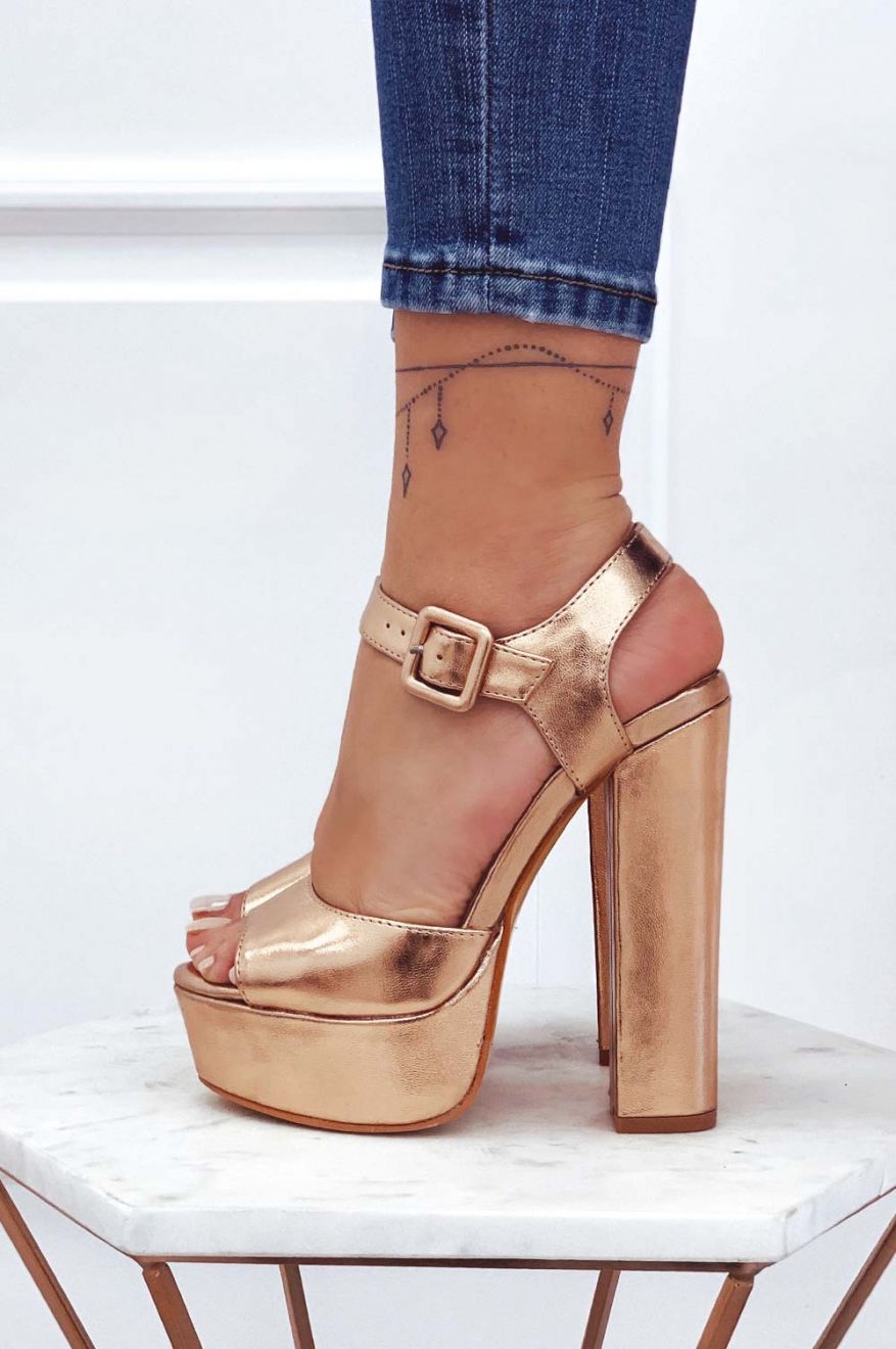Metallic rose gold high-heeled sandals