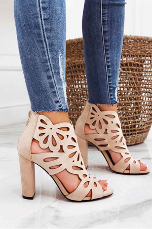 Beige perforated sandals with comfortable heel