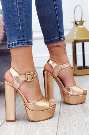Metallic rose gold high-heeled sandals