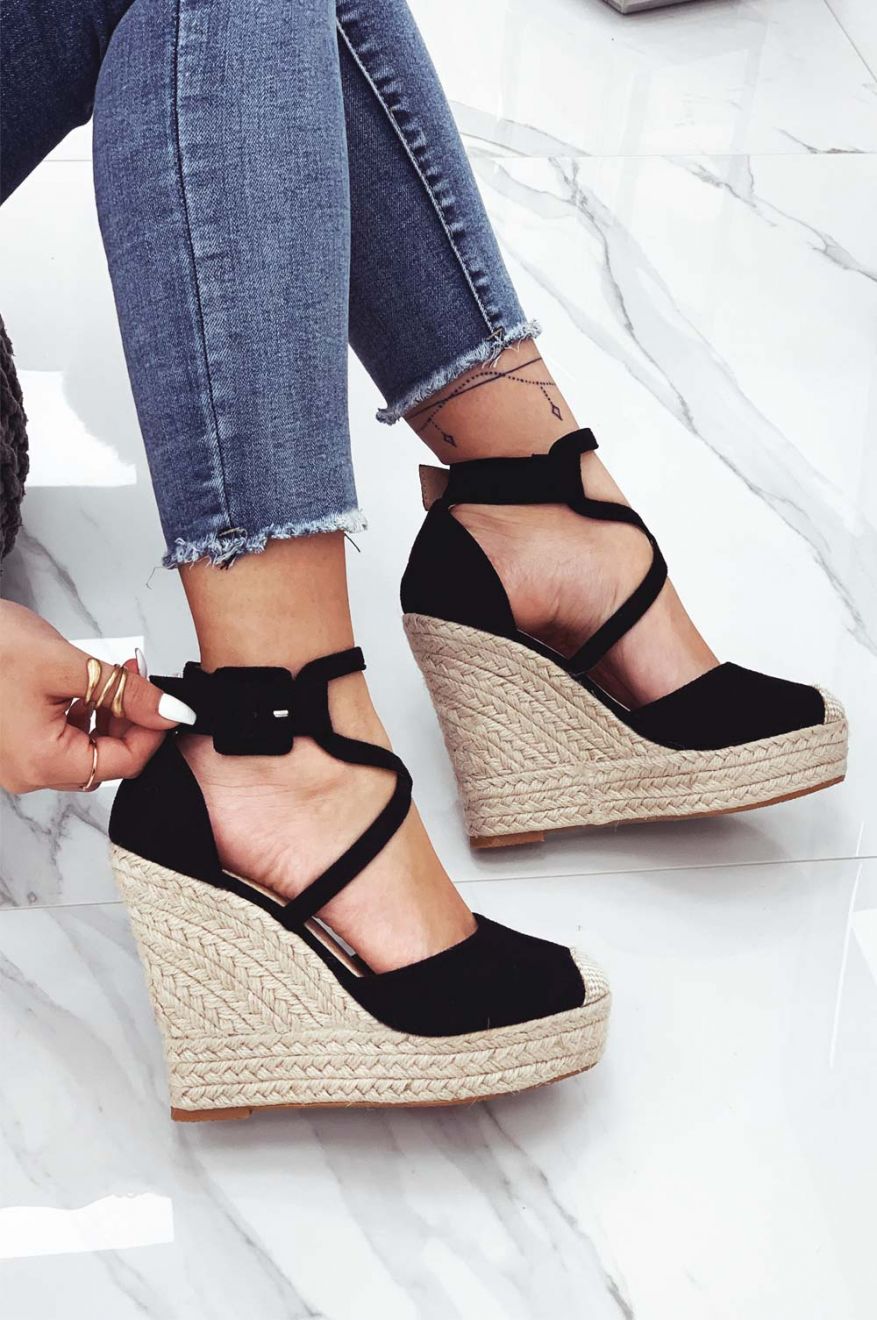 Black espadrilles with wedge heel and crossed straps