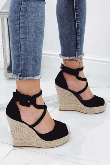 Black espadrilles with wedge heel and crossed straps
