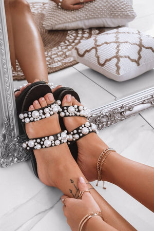 black strappy sandals with pearls