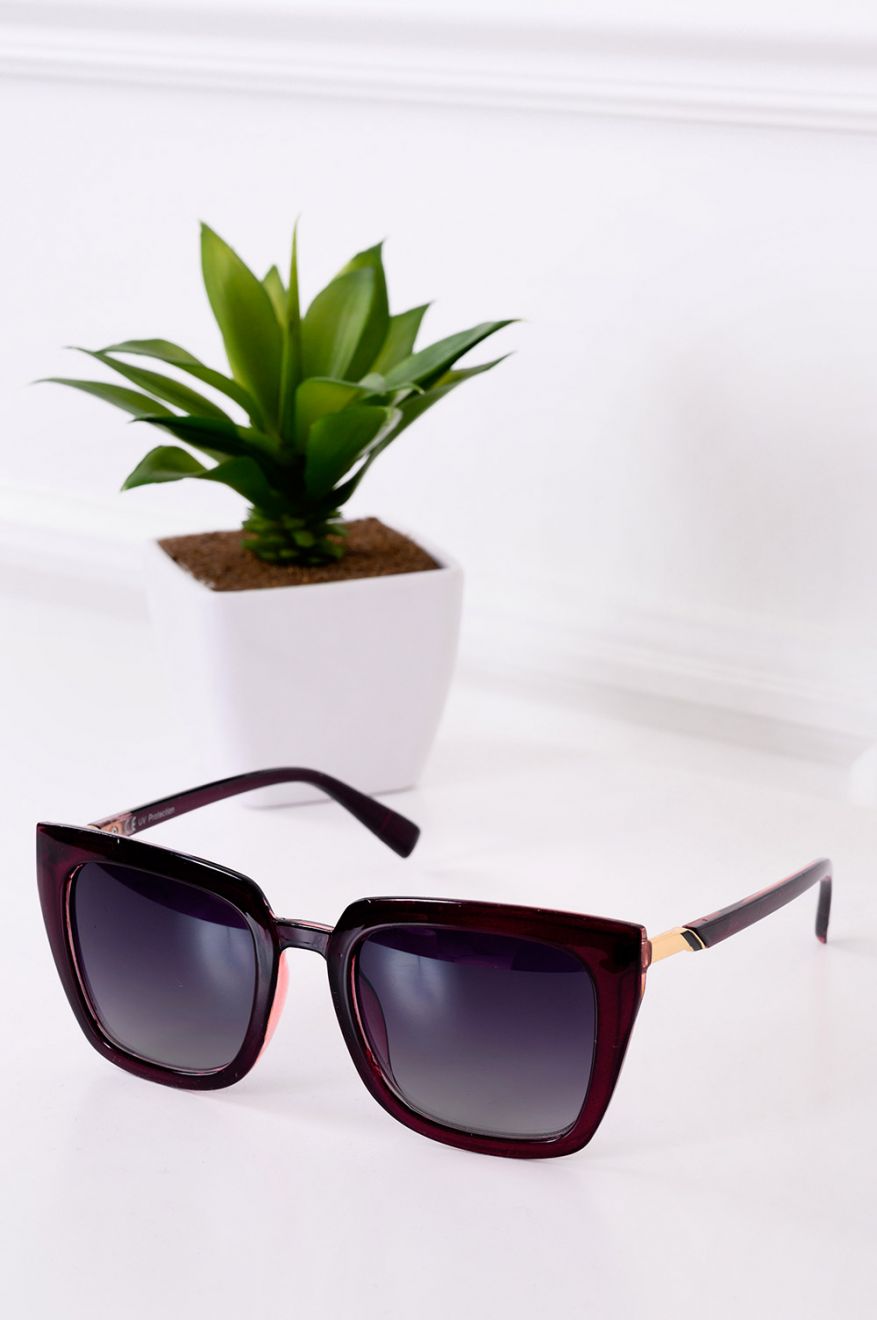 Sunglasses with thick burgundy frame