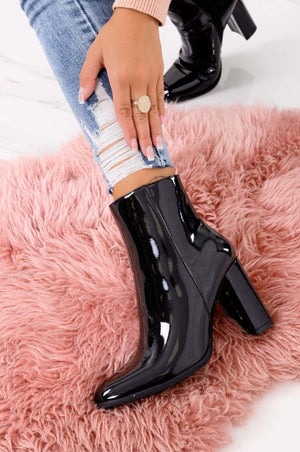 Black patent ankle boots with high heel