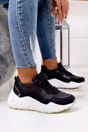 Black sneakers with python effect and thick sole