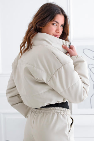 Short beige faux leather jacket