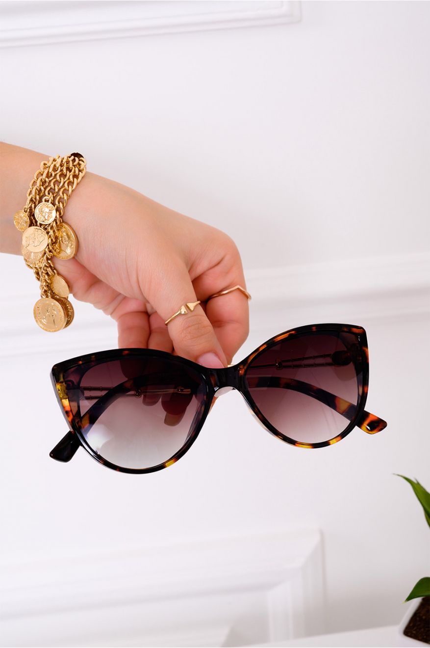 Lunettes de soleil marron à monture épaisse