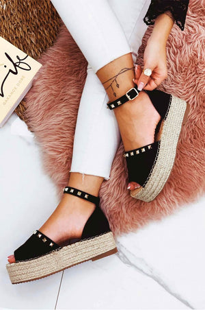 Espadrillas nere Alexoo con cinturino e borchie oro