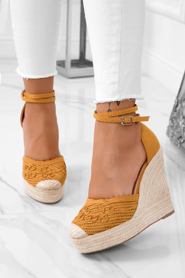 Yellow espadrilles with rope wedge and embroidery