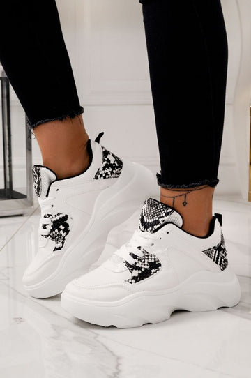 White sneakers with python-effect inserts and laces