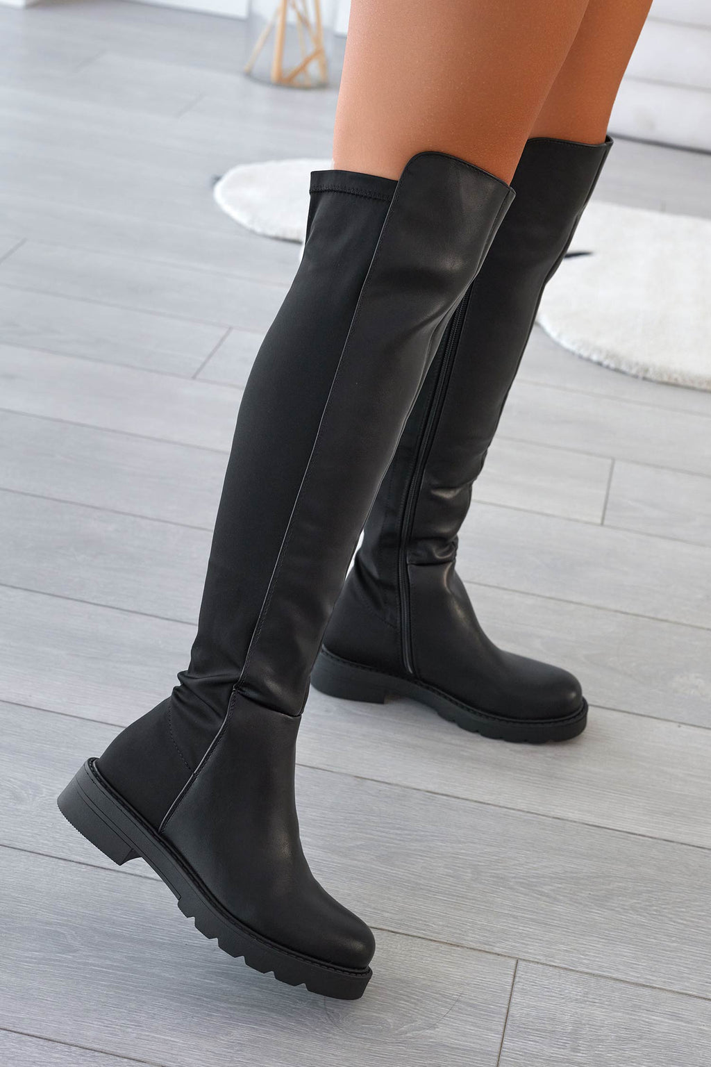 Cuissardes noires en tissu élastique